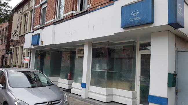 Ingang van Essalam Moskee in Geel